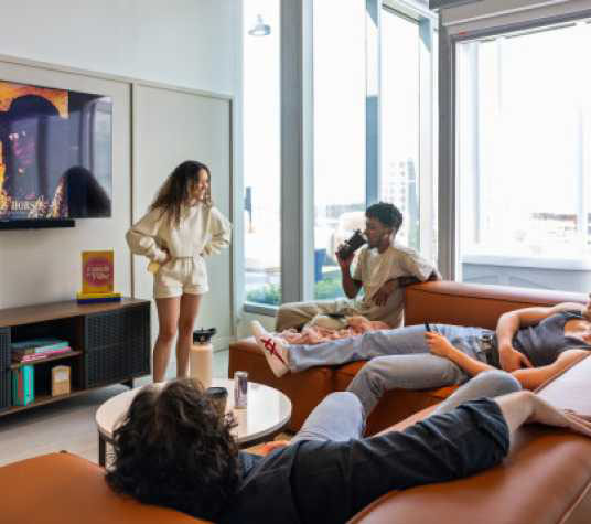 Friends hanging out in a living room